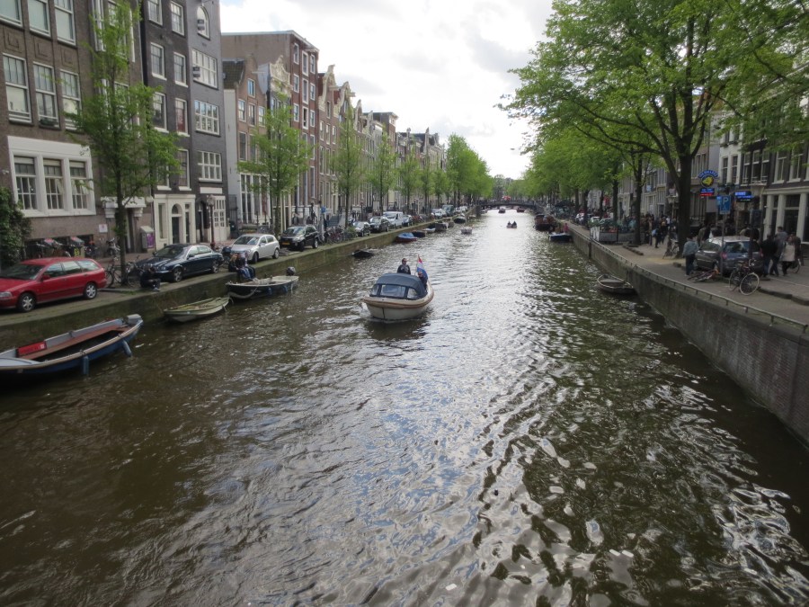 A boat on a canal in Amsterdam