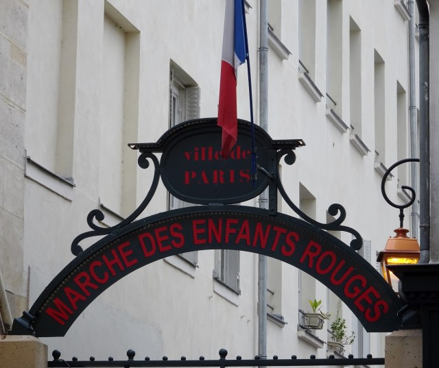 The sign for the historic Marche des Enfants Rouges covered market in Paris