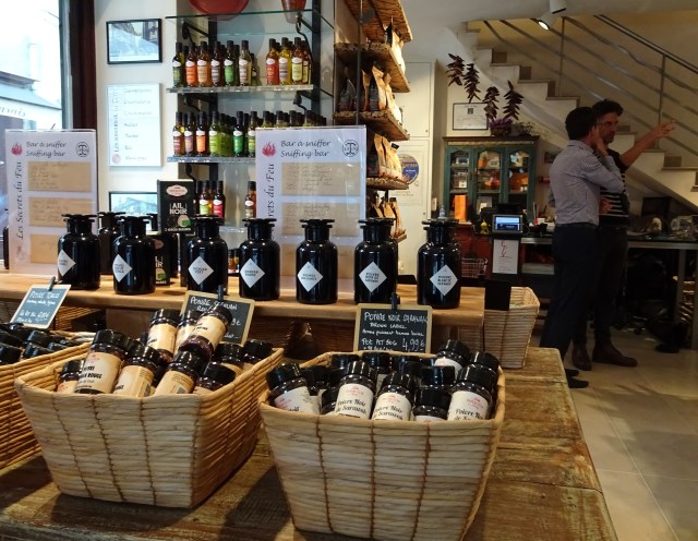 Bottles of fine olive oils and vinegars on display in the foodie favourite Elle Et L'huile retail shop in Marais