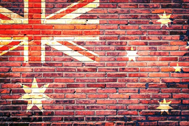 The flag of Australia imposed on a brick wall