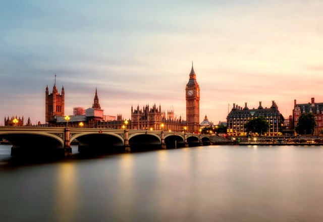 Walk across a bridge in London at sunrise