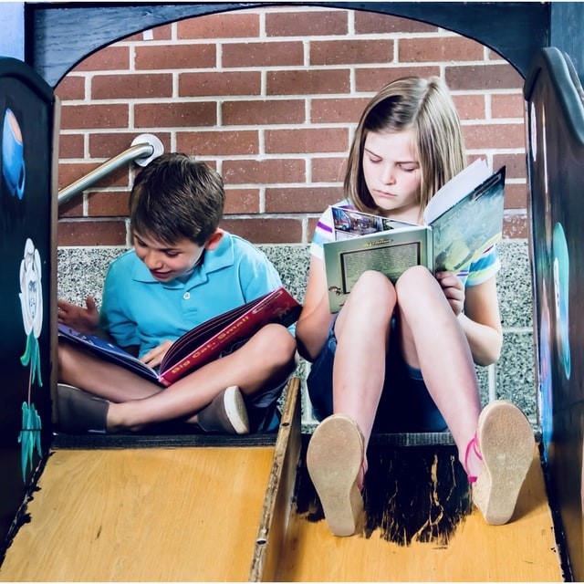 Two children reading
