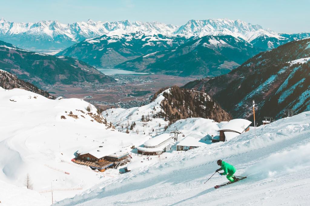 A person skiing on a mountain in Switzerland, one of Europe’s coolest mountain hangouts