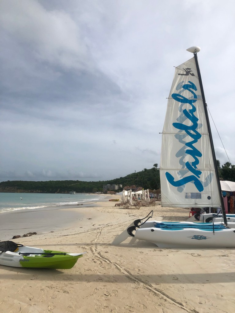 Sailboats and kayaks on the beach