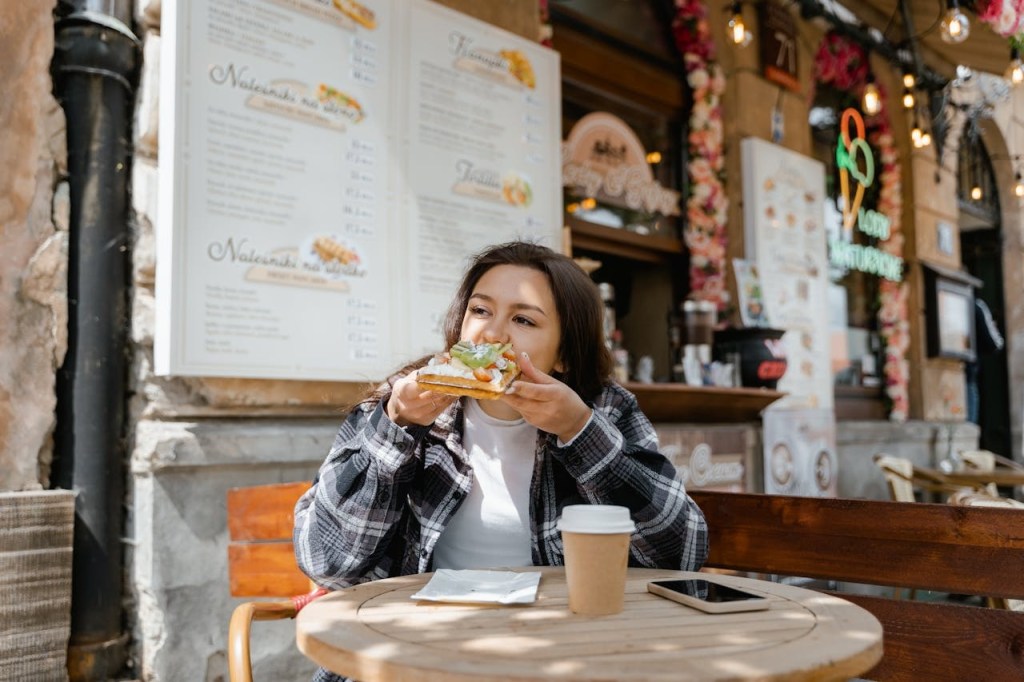 girl eating a sandwich